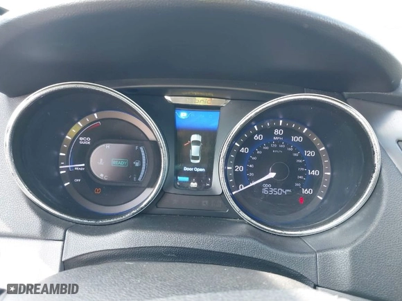 2012 Hyundai Sonata Hybrid with VIN KMHEC4A48CA027852, listed as a IAAI auction lot 41543446 with 163,504 mi miles. Bid and sale history available at carsss.com. Image 7.