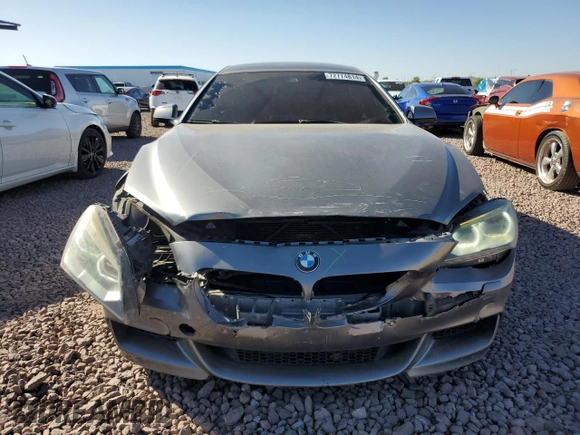 2014 BMW 6 Series 650i z VIN WBA6B2C57ED129034, wystawiony jako Copart lot #72774814 z przebiegiem 116 835 mil mil oraz Szkoda całkowita • Salvage title. Historia ofert i sprzedaży dostępna na DreamBid. Obrazek 5.