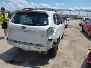 2015 Subaru Forester Touring with VIN JF2SJAWC0FH806493, listed as a IAAI auction lot 42355867 with 128,937 mi miles and . Bid and sale history available at DreamBid. Image 4.