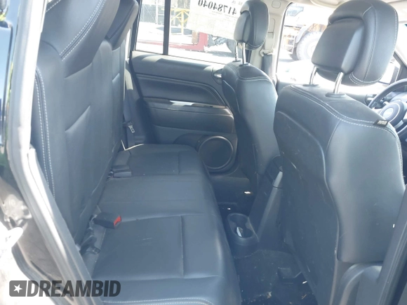 2014 Jeep Compass Limited with VIN 1C4NJDCBXED706173, listed as a IAAI auction lot 41784040 with 144,368 mi miles. Bid and sale history available at carsss.com. Image 8.