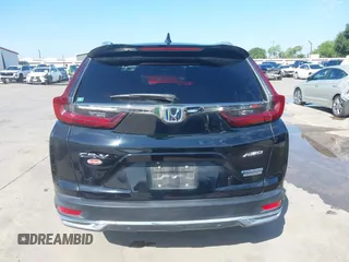 2020 Honda CR-V Touring z VIN 7FART6H91LE005707, wystawiony jako IAAI lot #42326337 z przebiegiem 40 555 mil mil oraz . Historia ofert i sprzedaży dostępna na DreamBid. Obrazek 17.
