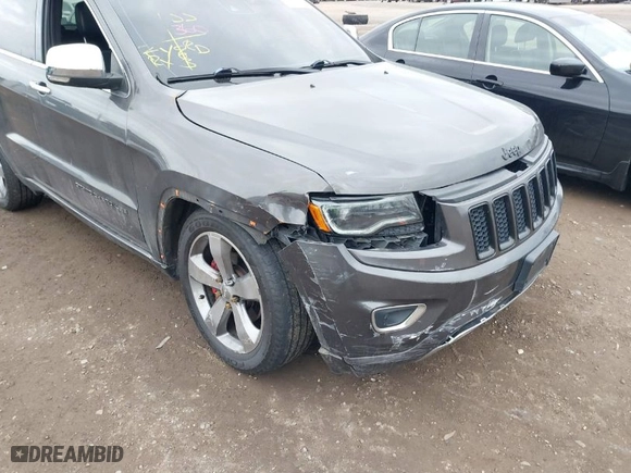 2014 Jeep Grand Cherokee Overland with VIN 1C4RJFCGXEC172008, listed as a IAAI auction lot 41719313 with 164,682 mi miles. Bid and sale history available at carsss.com. Image 6.