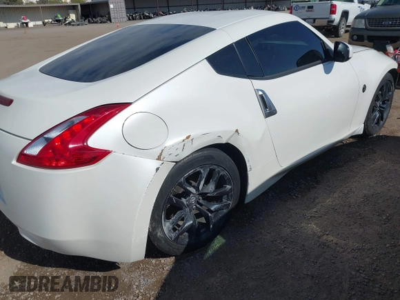 2016 Nissan 370Z Sport z VIN JN1AZ4EH9GM931683, wystawiony jako IAAI lot #42000779 z przebiegiem 113 919 mil mil oraz . Historia ofert i sprzedaży dostępna na DreamBid. Obrazek 6.
