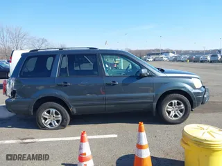 2003 Honda Pilot EX with VIN 2HKYF18503H610799, listed as a IAAI auction lot 41528867 with 323,810 mi miles. Bid and sale history available at carsss.com. Image 13.