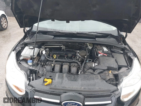 2013 Ford Focus SE with VIN 1FADP3F22DL308840, listed as a IAAI auction lot 42727900 with 112,694 mi miles and . Bid and sale history available at DreamBid. Image 10.