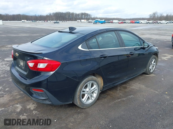 2017 Chevrolet Cruze LT with VIN 1G1BE5SM6H7199168, listed as a IAAI auction lot 41890885 with 105,127 mi miles and . Bid and sale history available at DreamBid. Image 4.