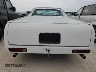 1984 Chevrolet El Camino z VIN 1GCCW80H7ER173291, wystawiony jako Copart lot #76606244 z przebiegiem Nie podano mil oraz Szkoda całkowita • Salvage title. Historia ofert i sprzedaży dostępna na DreamBid. Obrazek 6.
