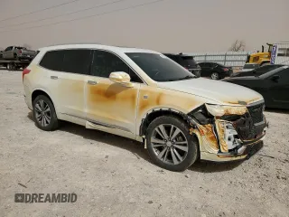 2020 Cadillac XT6 FWD Premium Luxury с VIN 1GYKPCRS3LZ108567, выставлен на аукционе Copart как лот 48582435 с пробегом 68 986 миль миль и Списание • Salvage title. История ставок и продаж доступна на DreamBid. Изображение 4.