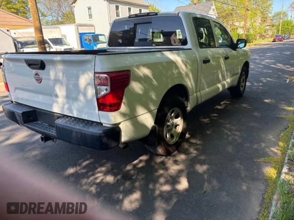 2017 Nissan Titan SV with VIN 1N6AA1EK5HN530011, listed as a Copart auction lot 57471455 with 216,992 mi miles and Clean title. Bid and sale history available at DreamBid. Image 4.