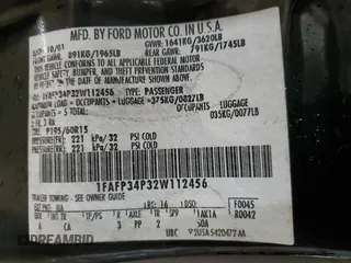 2002 Ford Focus SE with VIN 1FAFP34P32W112456, listed as a Copart auction lot 44006775 with 153,537 mi miles and Salvage Title. Bid and sale history available at carsss.com. Image 13.