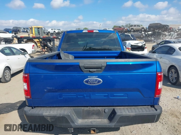 2018 Ford F-150 XL with VIN 1FTMF1CB7JFD79550, listed as a IAAI auction lot 41156870 with 72,629 mi miles and . Bid and sale history available at DreamBid. Image 16.