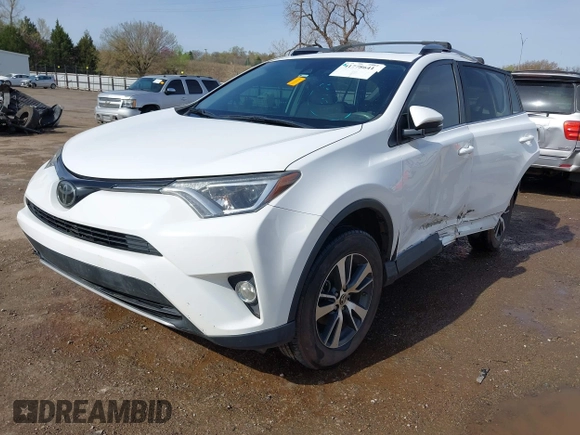 2017 Toyota RAV4 XLE with VIN 2T3WFREV3HW324973, listed as a IAAI auction lot 41778641 with 113,617 mi miles and . Bid and sale history available at DreamBid. Image 2.