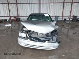 2001 Toyota Camry CE z VIN JT2BG22K410544168, wystawiony jako IAAI lot #42201412 z przebiegiem 158 500 mil mil oraz . Historia ofert i sprzedaży dostępna na DreamBid. Obrazek 12.