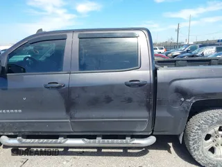 2015 Chevrolet Silverado 1500 LT with VIN 3GCUKREC2FG232302, listed as a IAAI auction lot 41652224 with 231,334 mi miles. Bid and sale history available at carsss.com. Image 14.