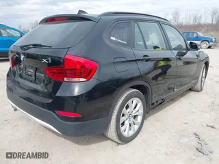 2013 BMW X1 xDrive28i with VIN WBAVL1C58DVR82070, listed as a IAAI auction lot 41849986 with 136,394 mi miles. Bid and sale history available at carsss.com. Image 4.