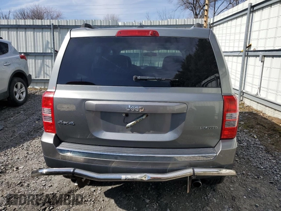 2014 Jeep Patriot Limited z VIN 1C4NJRCB3ED528619, wystawiony jako Copart lot #49765885 z przebiegiem 123 563 mil mil oraz Czysty tytuł • Clean title. Historia ofert i sprzedaży dostępna na DreamBid. Obrazek 6.