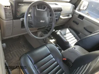 2004 Jeep Wrangler Rubicon with VIN 1J4FA69S64P751349, listed as a Copart auction lot 69642624 with 160,589 mi miles and Salvage Title. Bid and sale history available at carsss.com. Image 8.