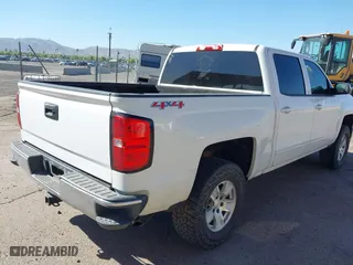 2015 Chevrolet Silverado 1500 LT with VIN 3GCUKREH3FG383502, listed as a IAAI auction lot 41946198 with 170,933 mi miles. Bid and sale history available at carsss.com. Image 4.