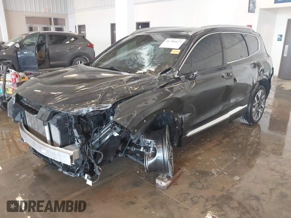 2023 Hyundai Santa Fe Calligraphy z VIN 5NMS5DAL6PH617083, wystawiony jako IAAI lot #41786072 z przebiegiem 29 563 mil mil oraz . Historia ofert i sprzedaży dostępna na DreamBid. Obrazek 2.