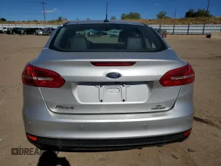 2016 Ford Focus SE with VIN 1FADP3F29GL314719, listed as a Copart auction lot 77686334 with 76,515 mi miles and Salvage title. Bid and sale history available at DreamBid. Image 6.