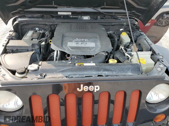 2013 Jeep Wrangler Sport z VIN 1C4AJWAG5DL671491, wystawiony jako Copart lot #59306745 z przebiegiem 111 778 mil mil oraz Szkoda całkowita • Salvage title. Historia ofert i sprzedaży dostępna na DreamBid. Obrazek 11.