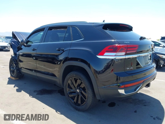 2022 Volkswagen Atlas SE z VIN 1V2KE2CA8NC220310, wystawiony jako IAAI lot #42218718 z przebiegiem 28 603 mil mil oraz . Historia ofert i sprzedaży dostępna na DreamBid. Obrazek 3.