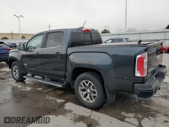 2018 GMC Canyon z VIN 1GTP6CE1XJ1173875, wystawiony jako Copart lot #47258005 z przebiegiem 104 076 mil mil oraz Szkoda całkowita • Salvage title. Historia ofert i sprzedaży dostępna na DreamBid. Obrazek 2.