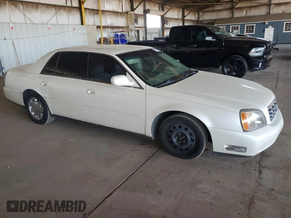 2001 Cadillac DeVille DHS z VIN 1G6KE57Y41U150631, wystawiony jako Copart lot #61805295 z przebiegiem 96 158 mil mil oraz Czysty tytuł • Clean title. Historia ofert i sprzedaży dostępna na DreamBid. Obrazek 4.