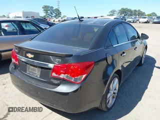2011 Chevrolet Cruze LTZ with VIN 1G1PH5S97B7132627, listed as a IAAI auction lot 42043940 with 185,258 mi miles and . Bid and sale history available at DreamBid. Image 4.