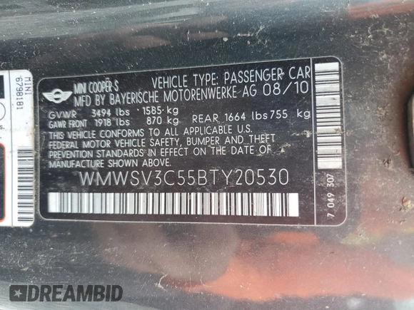 2011 MINI Hardtop S with VIN WMWSV3C55BTY20530, listed as a Copart auction lot 56016985 with Not Provided miles and Salvage Title. Bid and sale history available at DreamBid. Image 13.