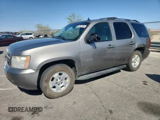 2007 Chevrolet Tahoe LT with VIN 1GNFK13027R241786, listed as a Copart auction lot 60067935 with 325,486 mi miles and Salvage title. Bid and sale history available at DreamBid. Image 1.