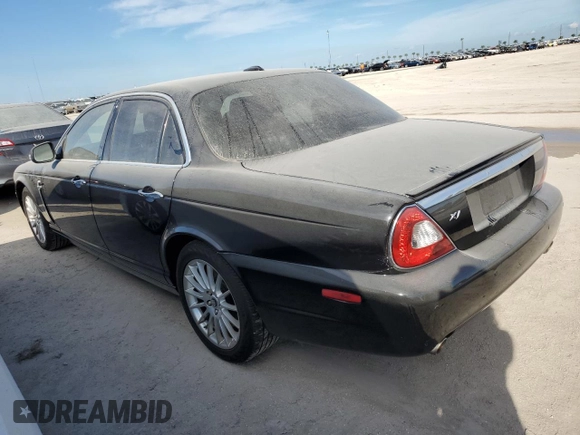 2008 Jaguar XJ with VIN SAJWA71B18SH25255, listed as a Copart auction lot 74781714 with 31,233 mi miles and Salvage Title. Bid and sale history available at carsss.com. Image 2.