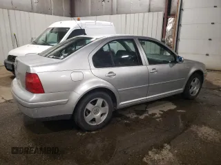 1999 Volkswagen Jetta z VIN 3VWSC29M4XM116002, wystawiony jako Copart lot #82159824 z przebiegiem 145 008 mil mil oraz Czysty tytuł • Clean title. Historia ofert i sprzedaży dostępna na DreamBid. Obrazek 3.
