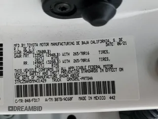 2021 Toyota Tacoma 4WD SR with VIN 3TMCZ5AN5MM431429, listed as a Copart auction lot 48203175 with 22,108 mi miles and Salvage Title. Bid and sale history available at carsss.com. Image 14.