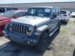 2021 Jeep Wrangler Unlimited Sport Altitude with VIN 1C4HJXDGXMW662493, listed as a IAAI auction lot 41288957 with 64,808 mi miles and . Bid and sale history available at DreamBid. Image 19.