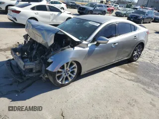 2014 Mazda Mazda6 i Touring with VIN JM1GJ1T58E1104066, listed as a Copart auction lot 46655205 with 130,857 mi miles and Salvage Title. Bid and sale history available at carsss.com. Image 1.