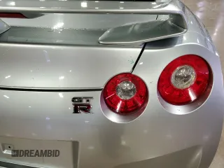 2009 Nissan GT-R Premium с VIN JN1AR54F89M252013, выставлен на аукционе Copart как лот 70656764 с пробегом 66 085 миль миль и Списание • Salvage title. История ставок и продаж доступна на DreamBid. Изображение 13.