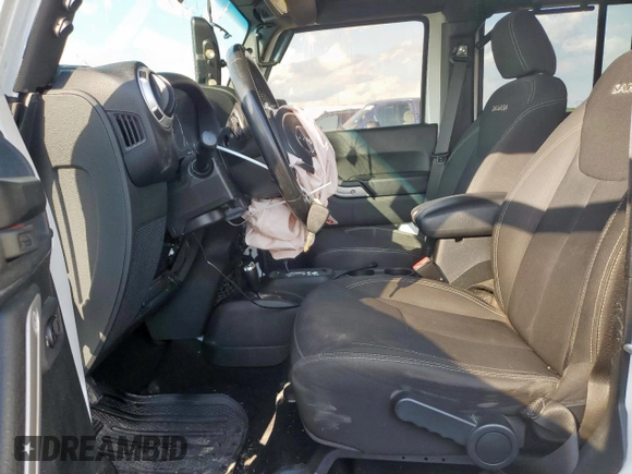 2017 Jeep Wrangler Unlimited Sahara with VIN 1C4HJWEG0HL585262, listed as a Copart auction lot 58748155 with 133,267 mi miles and Salvage title. Bid and sale history available at DreamBid. Image 7.