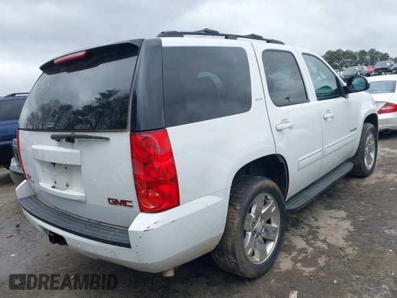 2013 GMC Yukon SLT with VIN 1GKS1CE00DR225296, listed as a IAAI auction lot 41854049 with 241,437 mi miles. Bid and sale history available at carsss.com. Image 4.