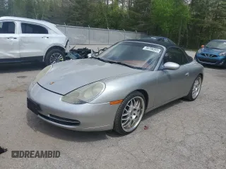 2000 Porsche 911 z VIN WP0CA2992YS654053, wystawiony jako Copart lot #56706365 z przebiegiem 153 481 mil mil oraz Czysty tytuł • Clean title. Historia ofert i sprzedaży dostępna na DreamBid. Obrazek 1.