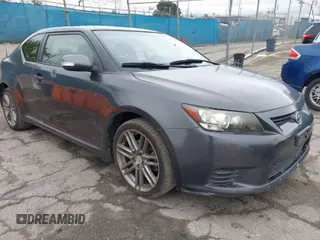 2013 Scion tC with VIN JTKJF5C76D3063500, listed as a IAAI auction lot 41916403 with 146,818 mi miles. Bid and sale history available at carsss.com. Image 1.
