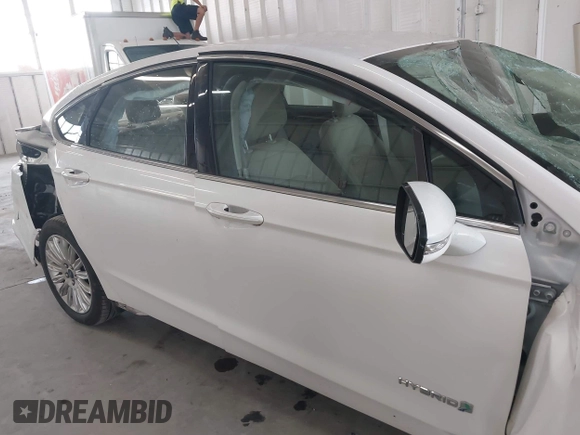 2013 Ford Fusion SE Hybrid with VIN 3FA6P0LU8DR357054, listed as a IAAI auction lot 42372168 with 143,979 mi miles and . Bid and sale history available at DreamBid. Image 13.
