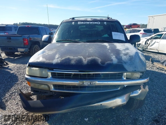 2005 Chevrolet Tahoe LT z VIN 1GNEC13T85J201856, wystawiony jako IAAI lot #41099372 z przebiegiem 303 169 mil mil oraz . Historia ofert i sprzedaży dostępna na DreamBid. Obrazek 12.