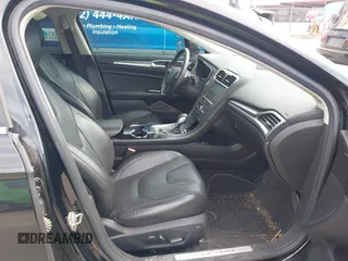 2016 Ford Fusion Titanium with VIN 3FA6P0K91GR220099, listed as a IAAI auction lot 41947778 with 140,252 mi miles and . Bid and sale history available at DreamBid. Image 5.