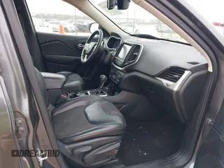 2016 Jeep Cherokee Trailhawk z VIN 1C4PJMBS4GW167650, wystawiony jako IAAI lot #41936549 z przebiegiem 218 000 mil mil oraz . Historia ofert i sprzedaży dostępna na DreamBid. Obrazek 5.