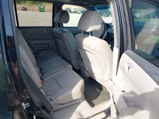 2015 Honda Pilot EX-L with VIN 5FNYF4H53FB054525, listed as a IAAI auction lot 42111022 with 148,305 mi miles and . Bid and sale history available at carsss.com. Image 8.