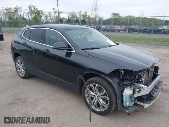 2018 BMW X2 xDrive28i with VIN WBXYJ5C34JEF72637, listed as a IAAI auction lot 42064330 with 96,725 mi miles. Bid and sale history available at carsss.com. Image 1.