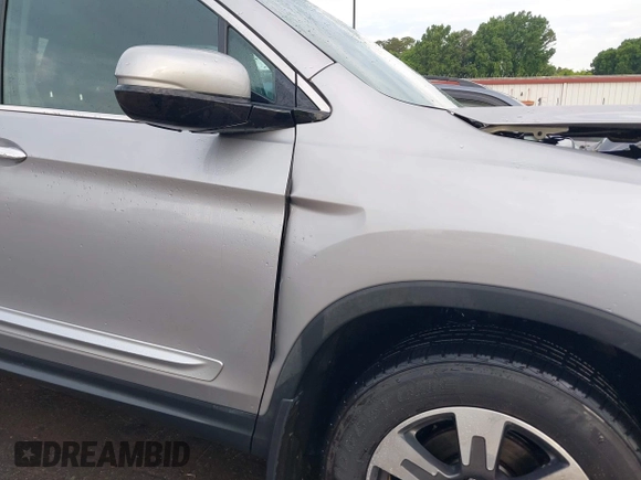 2019 Honda Ridgeline RTL-E with VIN 5FPYK3F72KB026100, listed as a IAAI auction lot 42205910 with 78,359 mi miles and . Bid and sale history available at DreamBid. Image 17.