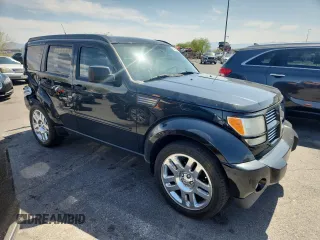 2011 Dodge Nitro Heat z VIN 1D4PT4GX6BW506192, wystawiony jako Copart lot #58795955 z przebiegiem 231 377 mil mil oraz Szkoda całkowita • Salvage title. Historia ofert i sprzedaży dostępna na DreamBid. Obrazek 4.