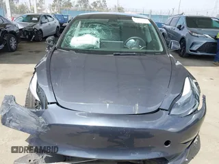 2023 Tesla Model 3 with VIN 5YJ3E1EA0PF518904, listed as a IAAI auction lot 42058540 with 20,945 mi miles and . Bid and sale history available at DreamBid. Image 11.